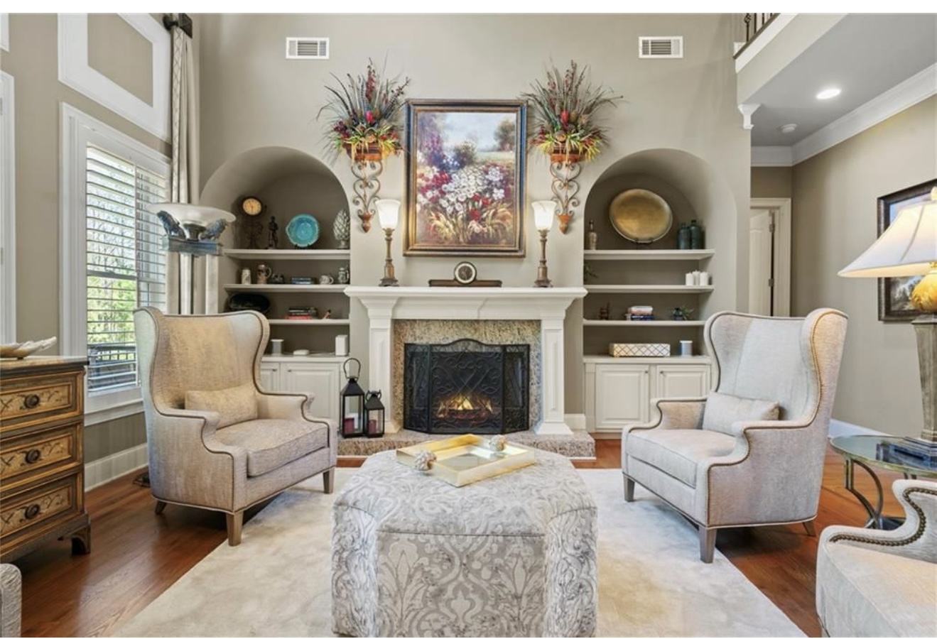 Luxury interior design living room in Atlanta featuring custom furniture, elegant décor, and natural lighting.